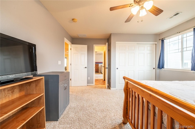 3902 Eagle Tail Ln, Castle Rock, CO 80104 - bedroom featuring light carpet, a closet, baseboards, and ceiling fan