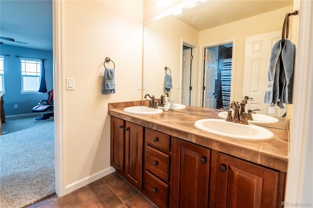 3902 Eagle Tail Ln, Castle Rock, CO 80104 - full bath featuring double vanity and baseboards