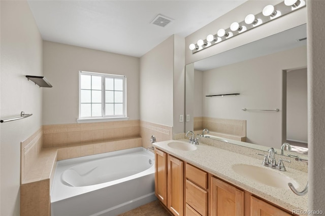 8399 Stonybridge Cir, Highlands Ranch, CO 80126 - bathroom featuring a bath, double vanity, and tile patterned floors