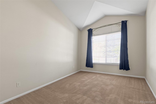 8399 Stonybridge Cir, Highlands Ranch, CO 80126 - empty room with carpet flooring and vaulted ceiling