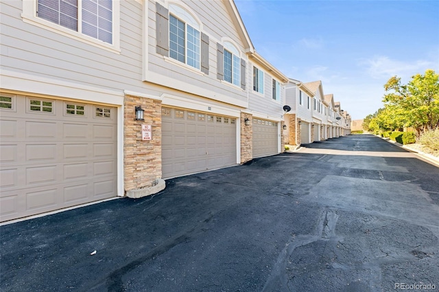 8399 Stonybridge Cir, Highlands Ranch, CO 80126 - view of asphalt road with a residential view