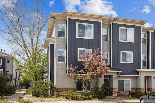 9300 E Florida Ave Unit 1107, Denver, CO 80247 - view of front of property with board and batten siding