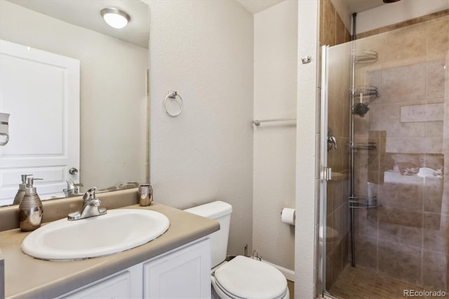 9300 E Florida Ave Unit 1107, Denver, CO 80247 - full bath featuring a shower stall, toilet, and vanity