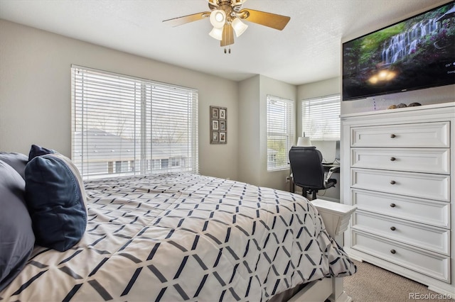 9300 E Florida Ave Unit 1107, Denver, CO 80247 - carpeted bedroom featuring a ceiling fan