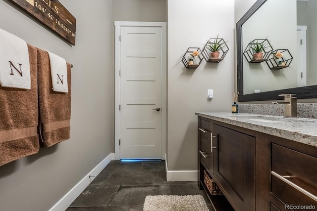 230 S Big Meadow Trl, Franktown, CO 80116 - bathroom with baseboards and vanity