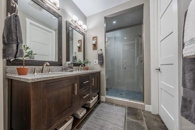 230 S Big Meadow Trl, Franktown, CO 80116 - bathroom featuring double vanity, a shower stall, and baseboards