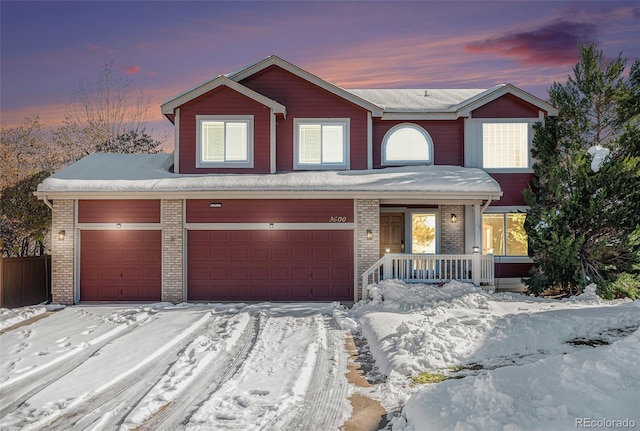 front of property with a garage