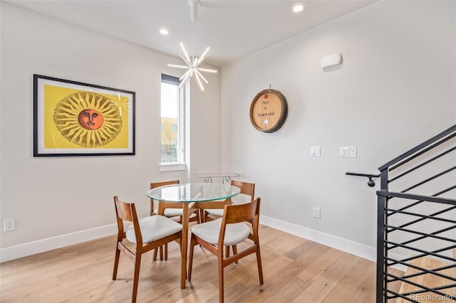 2350 Tremont Pl Unit 13, Denver, CO 80205 - dining space with light wood-style floors and recessed lighting