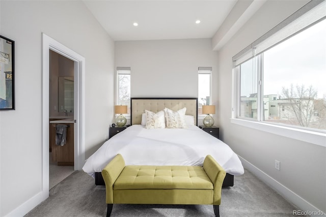 2350 Tremont Pl Unit 13, Denver, CO 80205 - bedroom featuring carpet floors, recessed lighting, and ensuite bathroom