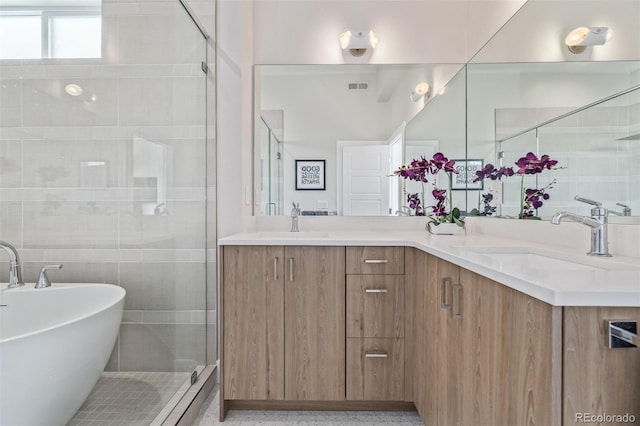 2350 Tremont Pl Unit 13, Denver, CO 80205 - full bathroom with double vanity, a stall shower, and a freestanding bath