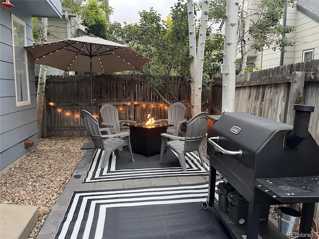 5425 W 115th Pl, Westminster, CO 80020 - view of patio / terrace with a fire pit and a grill
