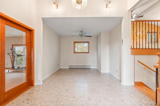 723 Brussels Dr, Parker, CO 80138 - empty room featuring ceiling fan and a baseboard radiator