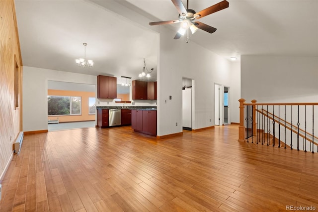 723 Brussels Dr, Parker, CO 80138 - unfurnished living room featuring a chandelier, ceiling fan, high vaulted ceiling, wood finished floors, and a baseboard radiator
