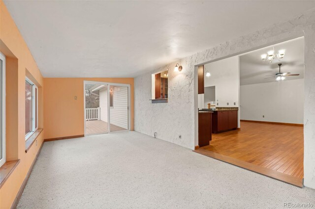 723 Brussels Dr, Parker, CO 80138 - unfurnished living room with a ceiling fan and light carpet