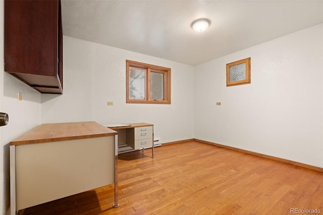 723 Brussels Dr, Parker, CO 80138 - empty room with light wood-type flooring and baseboards