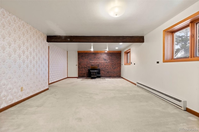723 Brussels Dr, Parker, CO 80138 - basement featuring baseboard heating, a wood stove, carpet flooring, and wallpapered walls