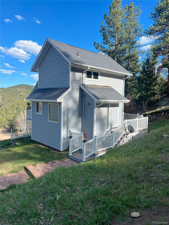 137 Bob Cat Trl, Bailey, CO 80421 - back of property with a deck and a yard