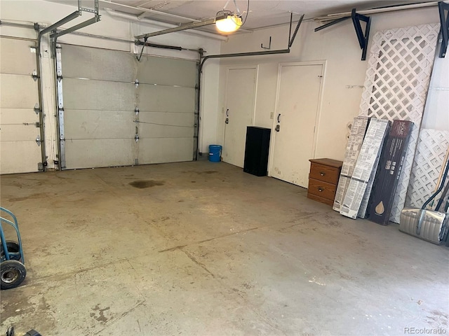137 Bob Cat Trl, Bailey, CO 80421 - garage featuring a garage door opener