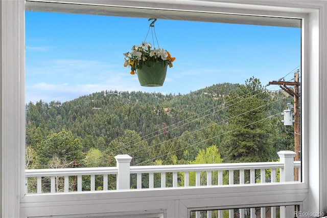 137 Bob Cat Trl, Bailey, CO 80421 - view of mountain backdrop with a heavily wooded area
