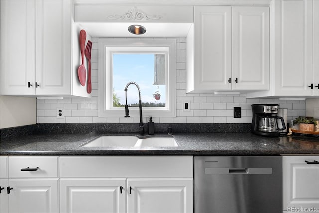 137 Bob Cat Trl, Bailey, CO 80421 - kitchen featuring stainless steel dishwasher, a sink, dark countertops, white cabinetry, and decorative backsplash