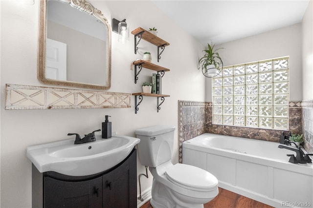 137 Bob Cat Trl, Bailey, CO 80421 - full bath with a garden tub, vanity, toilet, and wood finished floors