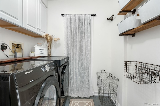 137 Bob Cat Trl, Bailey, CO 80421 - laundry area with independent washer and dryer, cabinet space, and baseboards