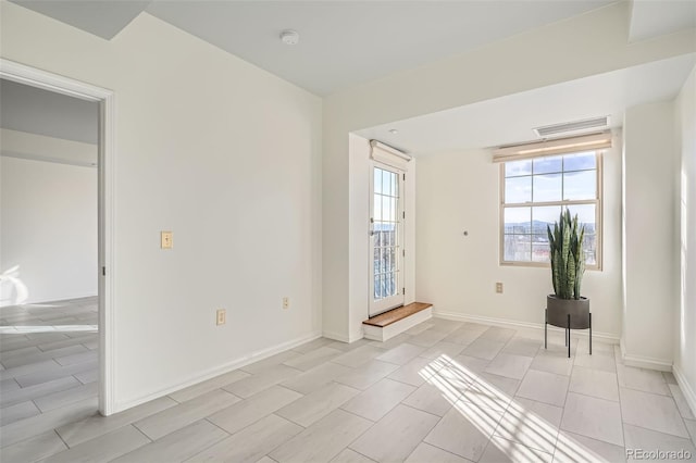 view of tiled empty room