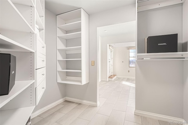 300 W 11th Ave Unit 4F, Denver, CO 80204 - walk in closet with light tile patterned floors