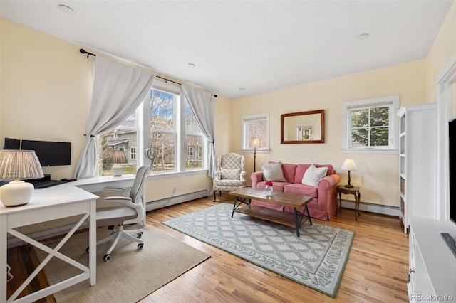 45 Bridge St, Breckenridge, CO 80424 - office featuring baseboard heating, healthy amount of natural light, and light wood-style floors