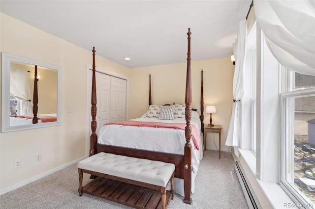45 Bridge St, Breckenridge, CO 80424 - bedroom with light colored carpet, baseboards, a closet, and a baseboard radiator
