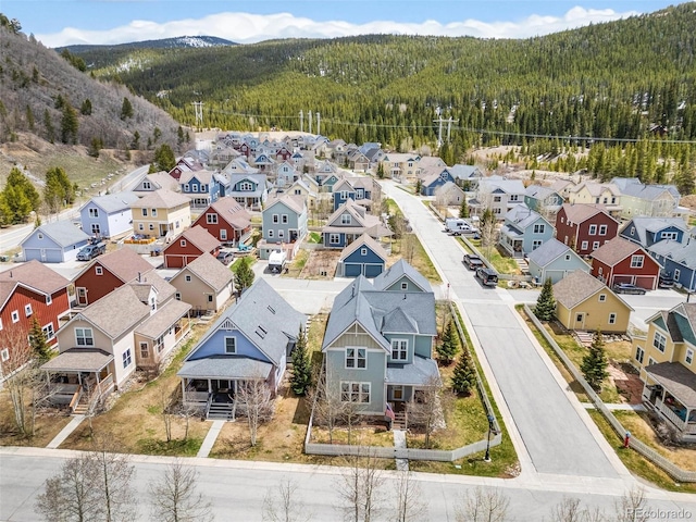 45 Bridge St, Breckenridge, CO 80424 - aerial perspective of suburban area with a heavily wooded area and mountains