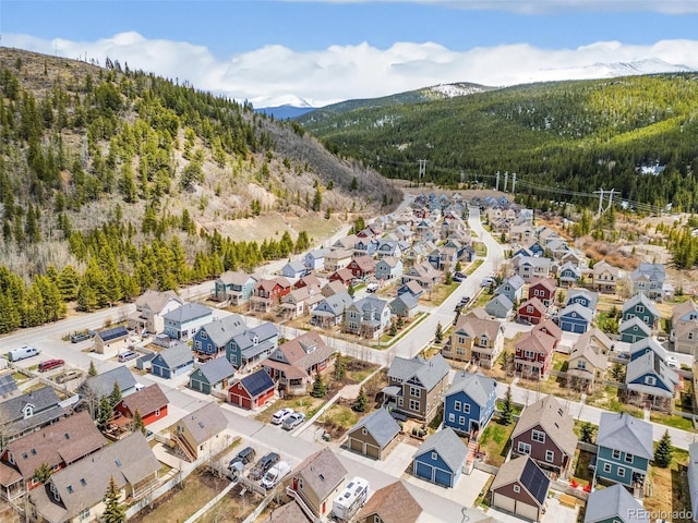 45 Bridge St, Breckenridge, CO 80424 - aerial view of residential area featuring a mountain backdrop and a forest