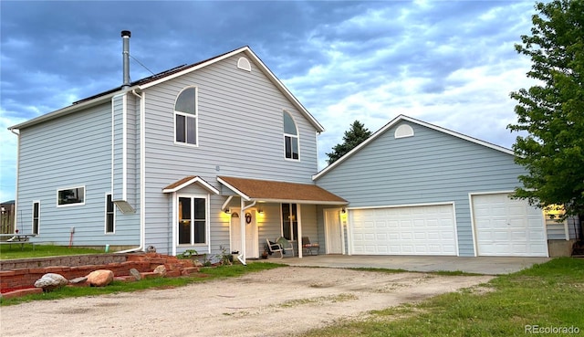 8370 Midsummer Ln, Elizabeth, CO 80107 - view of front facade with driveway and a porch