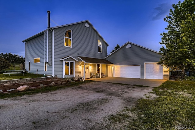 8370 Midsummer Ln, Elizabeth, CO 80107 - view of front of home with dirt driveway and an attached garage