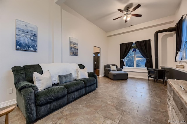 8370 Midsummer Ln, Elizabeth, CO 80107 - living area featuring ceiling fan and a wood stove