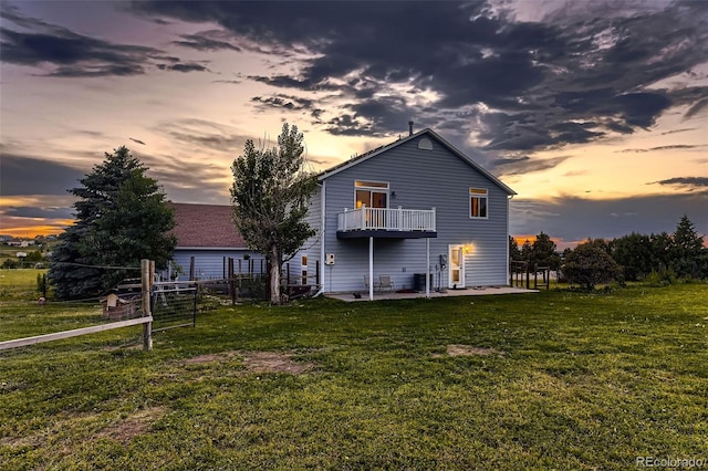 8370 Midsummer Ln, Elizabeth, CO 80107 - rear view of property with a balcony and a patio