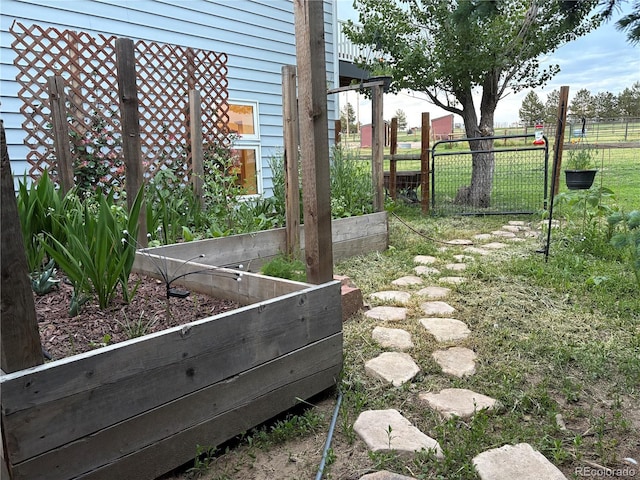 8370 Midsummer Ln, Elizabeth, CO 80107 - view of yard featuring a garden