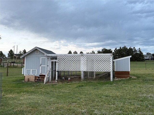 8370 Midsummer Ln, Elizabeth, CO 80107 - view of yard with entry steps and an outdoor structure
