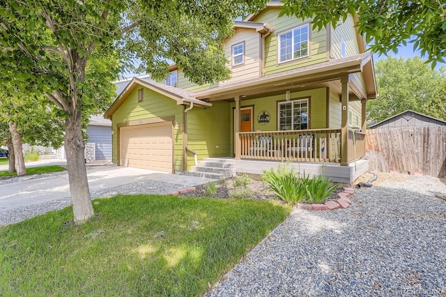 676 Hedgerow Way, Brighton, CO 80601 - view of front of property with a porch, concrete driveway, and a garage