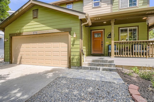 676 Hedgerow Way, Brighton, CO 80601 - view of front of home with concrete driveway, an attached garage, and covered porch