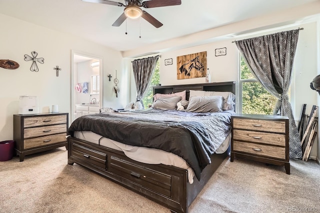 676 Hedgerow Way, Brighton, CO 80601 - bedroom with light carpet, connected bathroom, and a ceiling fan