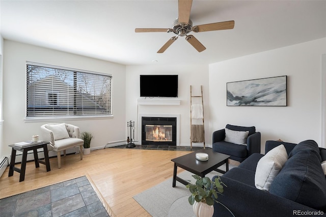 1830 22nd St Unit 16, Boulder, CO 80302 - living area with wood finished floors, a fireplace with flush hearth, and ceiling fan