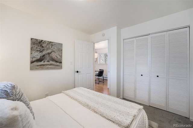 1830 22nd St Unit 16, Boulder, CO 80302 - bedroom featuring a closet and carpet floors