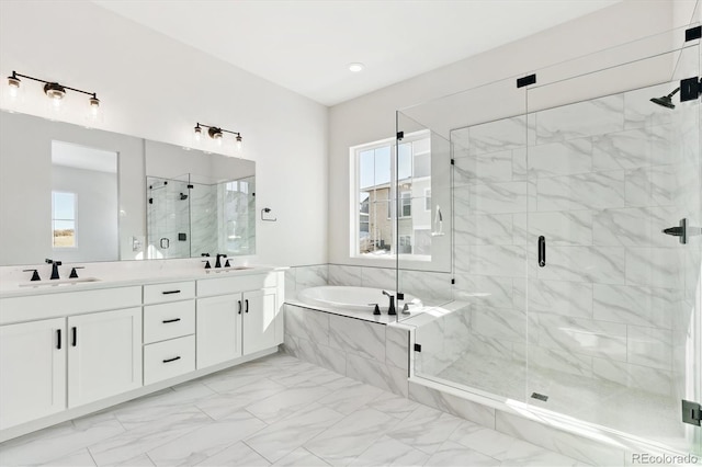 bathroom featuring plenty of natural light, vanity, and shower with separate bathtub