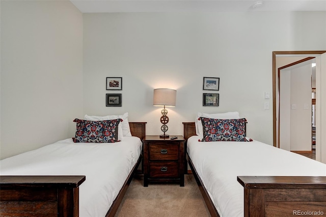 bedroom with light carpet
