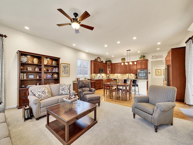2571 Hunters Pl, Highlands Ranch, CO 80129 - living area featuring ceiling fan and recessed lighting