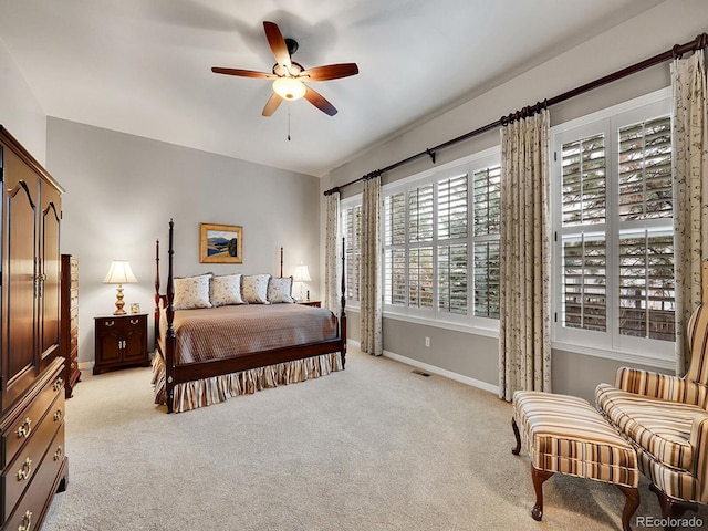 2571 Hunters Pl, Highlands Ranch, CO 80129 - bedroom featuring baseboards, light carpet, visible vents, and a ceiling fan