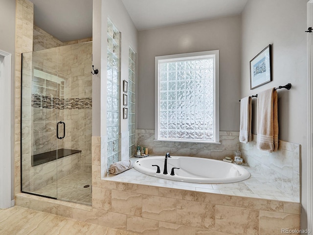 2571 Hunters Pl, Highlands Ranch, CO 80129 - full bath featuring a garden tub and a shower stall
