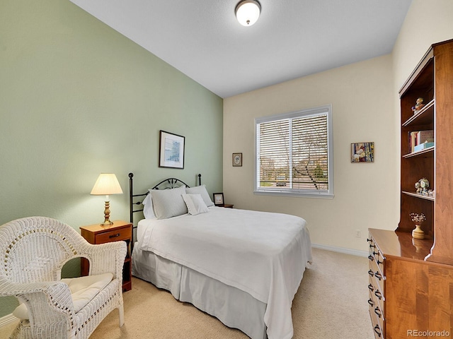 2571 Hunters Pl, Highlands Ranch, CO 80129 - bedroom featuring baseboards and light carpet