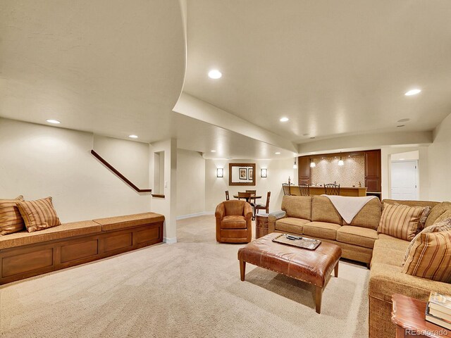 2571 Hunters Pl, Highlands Ranch, CO 80129 - living area featuring light colored carpet, baseboards, and recessed lighting